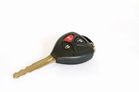 Car key with remote control isolated over white background Foto stock