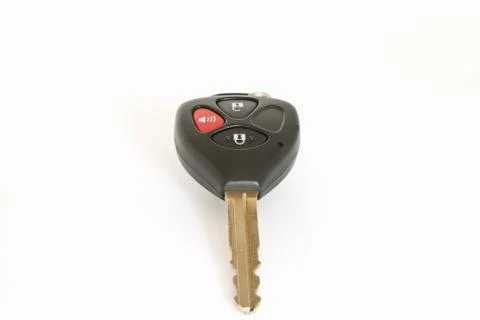 Car key with remote control isolated over white background Stock Photos