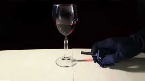Car key on a white table and hand with wine glass Stock Footage 178472218