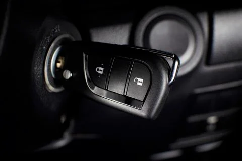 Car keyless remote on a keyhole. Stock-Fotos