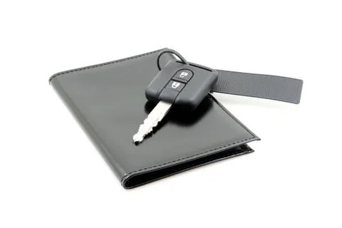 Car keys and documents Stock Photos