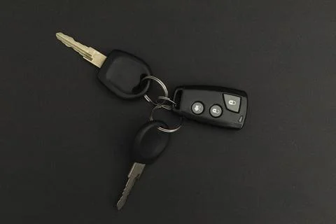 Car keys on black background Stock Photos