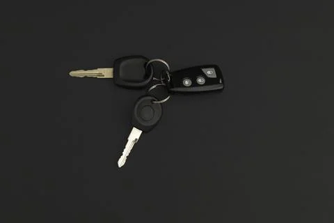 Car keys on black background Stock Photos