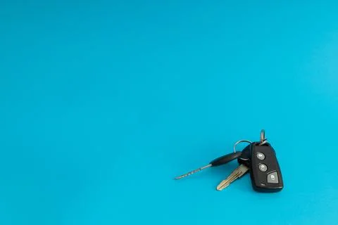 Car keys on blue background Stock Photos