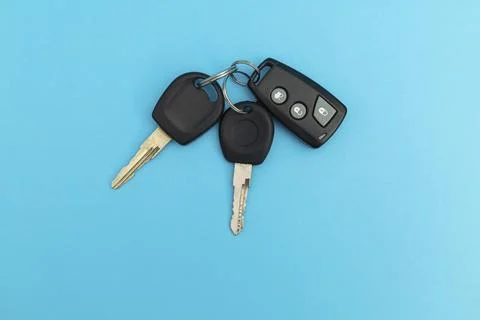 Car keys on blue background Stock Photos