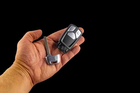 Car keys, central locking remote control on your hand Stock Photos