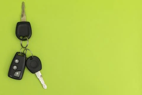 Car keys on green background Stock Photos