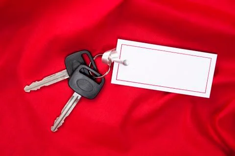 Car keys on red Stock-Fotos