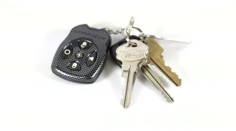 Car Keys rotating on white background Stock Footage 40343584