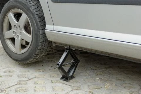 Car lifted up Stock Photos