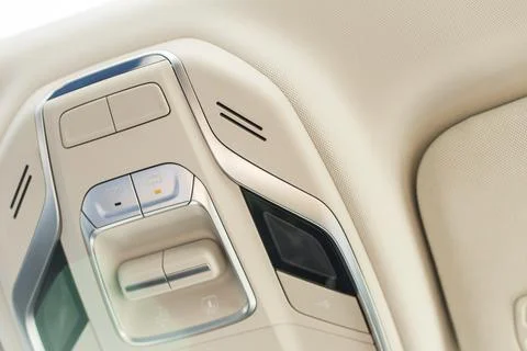 Car light panel on the top with buttons, air conditional and sun box Stock Photos
