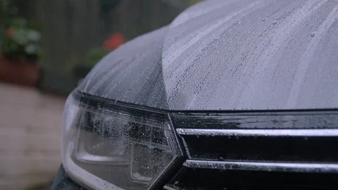 Car light in rain with indicator flashing Stock Footage 112347435