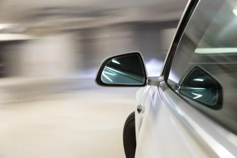 Car light trail while driving in the coty by night Stock Photos