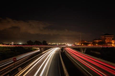 Car Light Trails on Highway Approaching and Leaving Valencia Stock Photos