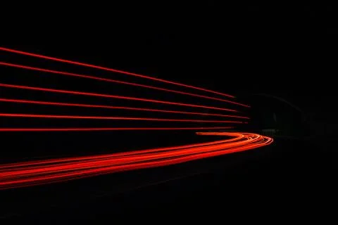 Car light trails in the tunnel. Stock Photos