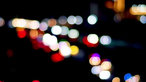 Car lights with bokeh effect at night Stock Footage 329829704