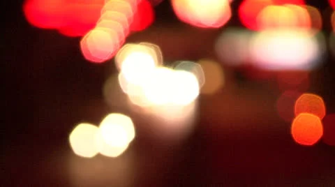 Car lights at night bokeh Stock Footage 24634533