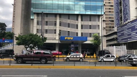 Car lines at a queue to refill gasoline at a PDVSA queue Stock Footage 169406930