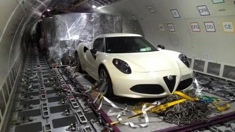 Car loading in cargo plane Stock Photos