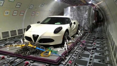 Car loading in cargo plane Stock Photos