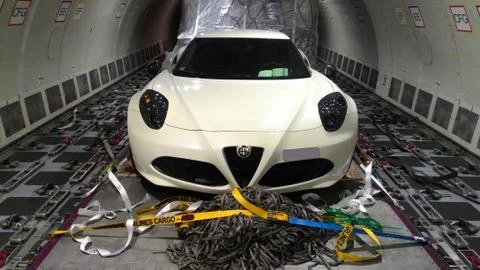 Car loading in cargo plane Stock Photos