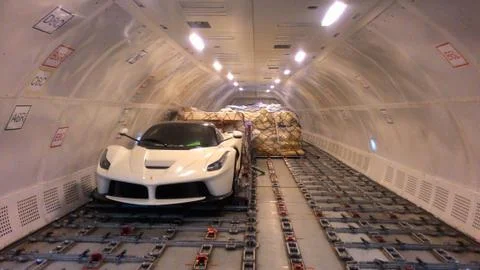 Car loading in cargo plane Stock Photos