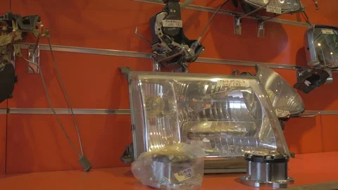 Car locks, headlights and wing mirror in a store Stock Footage 97244688