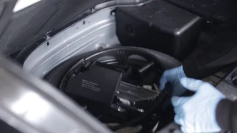 Car Maintenance - Removing the Tire Jack Stock Footage 76080602