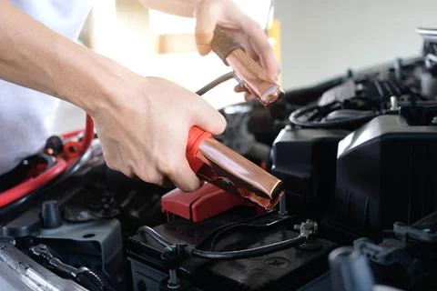Car maintenance technician He is checking the auto engine, car inspection cen Stock Photos