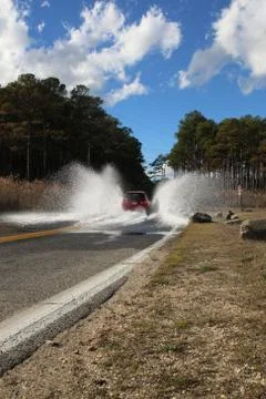 A Car Making A Splash Stock Photos