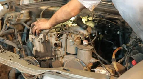 Car Master Examining Engine Stock-Footage 22420764