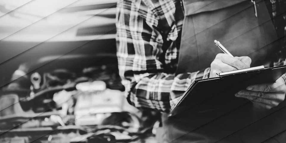 Car mechanic checking a car engine, geometric pattern Stock Photos