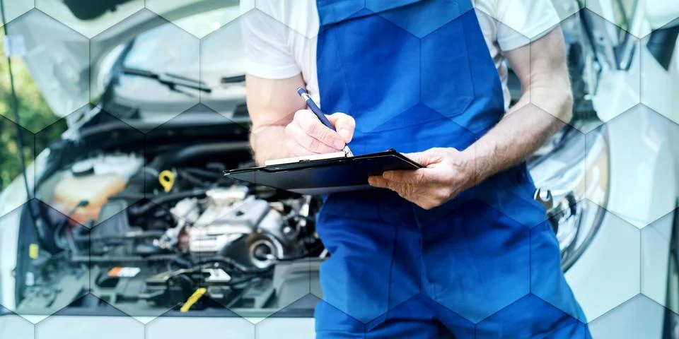 Car mechanic checking a car engine, geometric pattern Stock Photos
