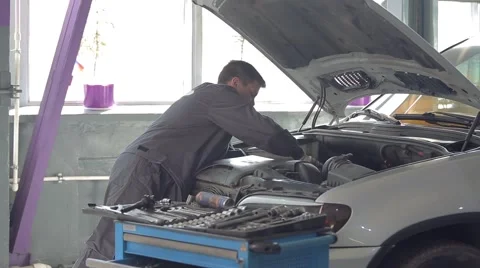 Car Mechanic Fixing Car Stock Footage 62166429