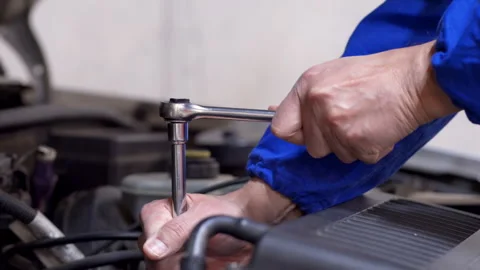 Car mechanic hands and engineer wrench tools working on automobile performanc Vidéo 297775763