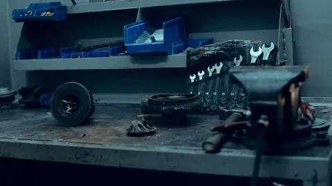 Car mechanic hands in garage with old and used turbocharger. Turbine Concept Stock Footage 73727480