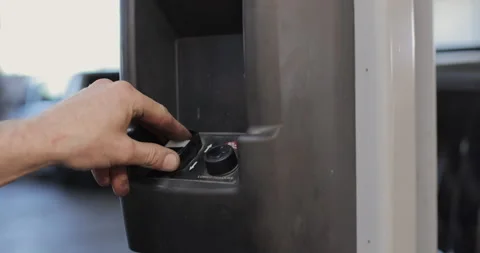 Car mechanic presses a button on the car lift. Car repair service. Stock Footage 341870947