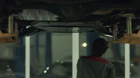 Car mechanic at work Stock Footage 49992712