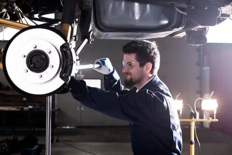 Car mechanic at work Stock Photos