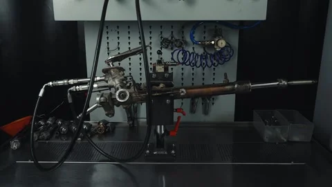 Car mechanical steering rack close -up on the highg pressure oil stand Stock Footage 285643936