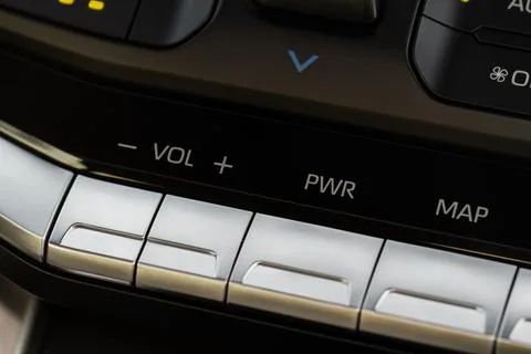 Car media controller close up. Modern car media and navigation control button Foto stock