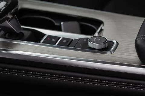 Car media controller close up. Modern car media and navigation control button Foto stock