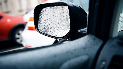 Car mirror covered in ice during freezing rain phenomenon 스톡 동영상 92171159