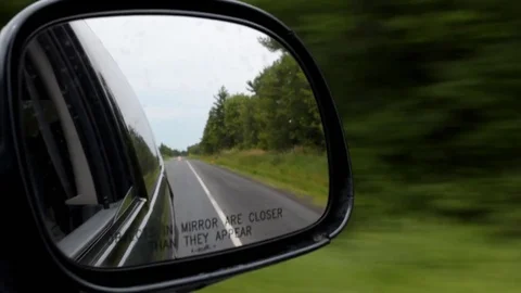 Car mirror in motion Stock Footage 76317939