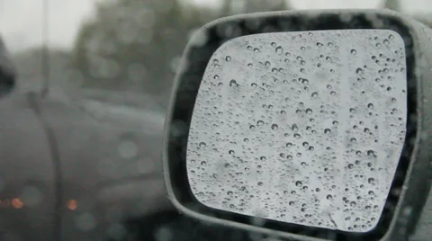 Car mirror at rain Stock Footage 34133778