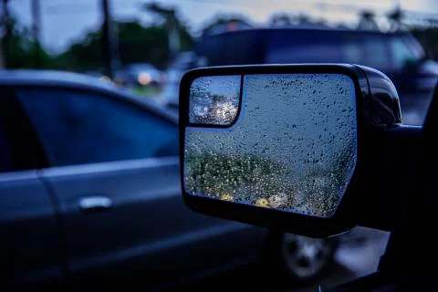 Car Mirror With Rain On It Stock Photos