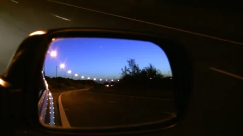 Car mirror view driving at night Stock Footage 44685654