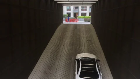 Car is mooving Underground Parking inside a Shopping Mall Stock Footage 196741445
