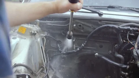 A car with a motor removed from it. Stock Footage 78852948