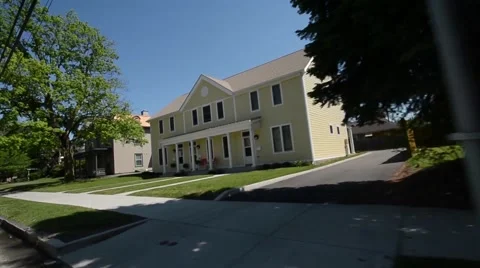 Car Mount Shot Driving Down the Main Street of Houses in New Brighton, PA Stock Footage 58252714
